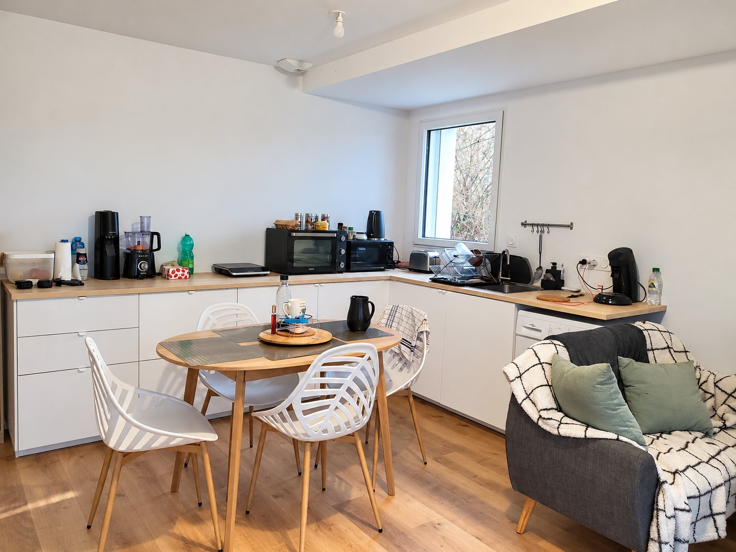 La cuisine et le coin salon des Apparts